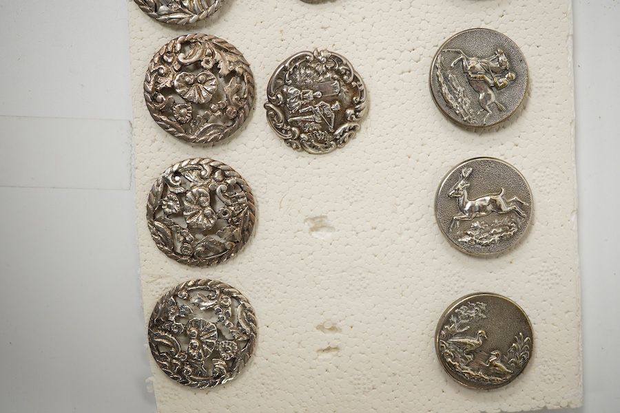 A set of 4 Edwardian cast silver buttons, decorated with a lady and gallant, Levi & Salaman, Birmingham 1901, 27mm, a set of 6 unmarked cast metal buttons decorated with flowers, 30mm and a set of 6 French Perfectionne w